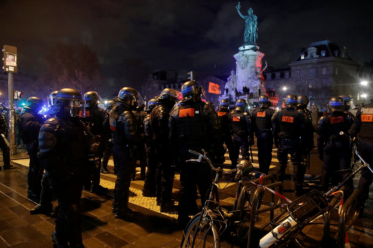 rench police face off with demonstrators at the Place de la Republique during a demonstration against the "Global Security Bill'', that right groups say would make it a crime to circulate an image of a police officer's face and would infringe journalists' freedom in the country, in Paris, France, on 12 December 2020