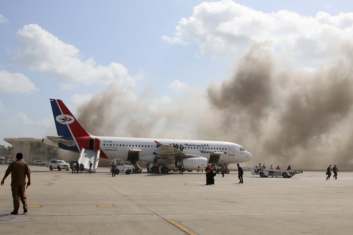 Dust rises after explosions hit Aden airport, upon the arrival of the newly-formed Yemeni government in Aden, Yemen 30 December, 2020