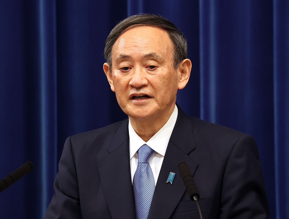 Japan's Prime Minister Yoshihide Suga speaks during a press conference at his official residence in Tokyo on 4 January