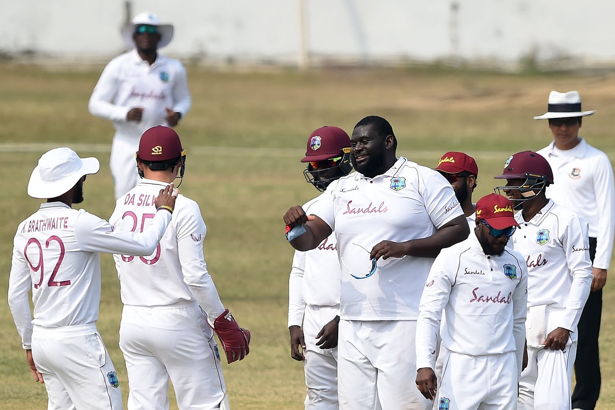 West Indies' players celebrate the dismissal of Bangladesh's Akbar Ali during a tour match between the West Indies and Bangladesh Cricket Board XI at the MA Aziz Stadium in Chittagong on 30 January 2021
