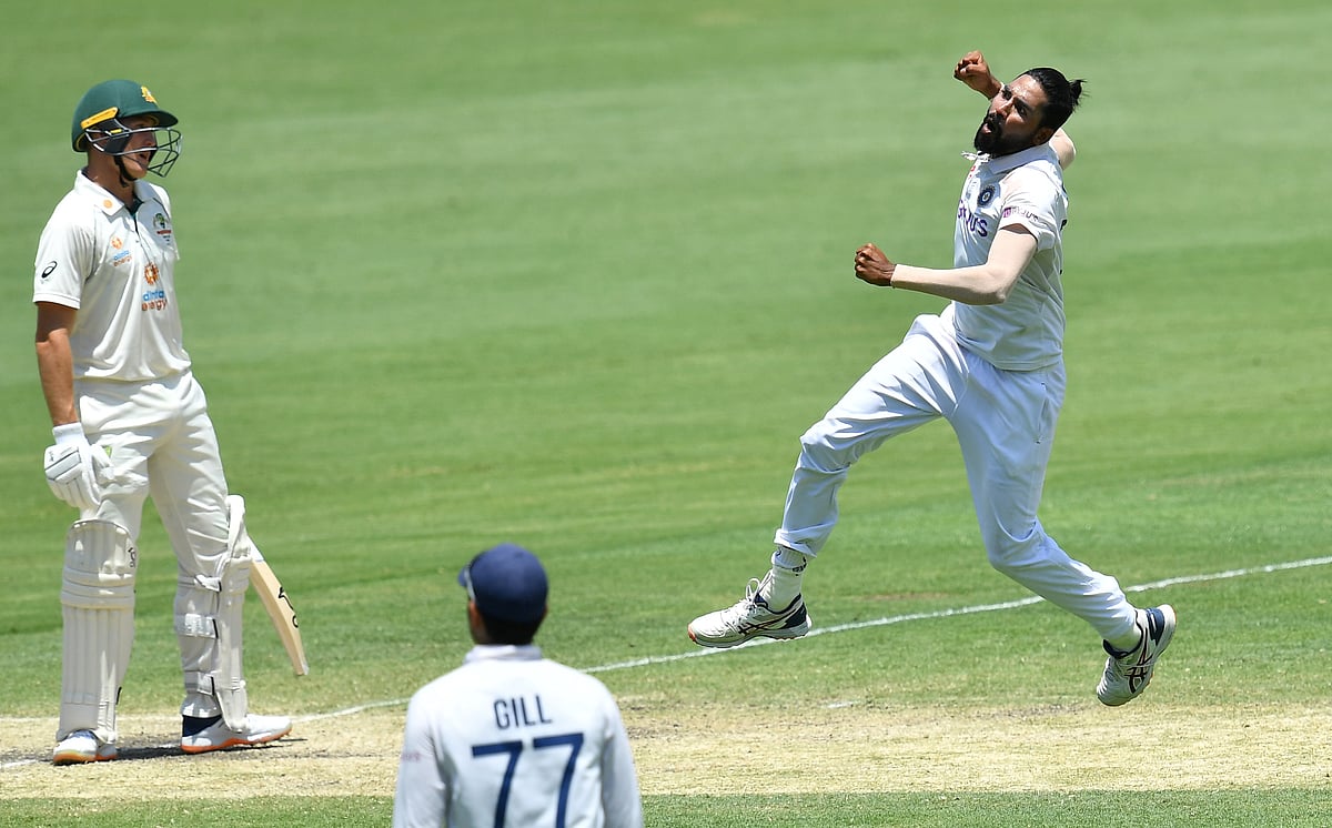 Mohammed Siraj of India celebrates the wicket of Marnus Labuschagne of Australia during day four of the fourth Test match between Australia and India at the Gabba in Brisbane, Australia, 18 January, 2021