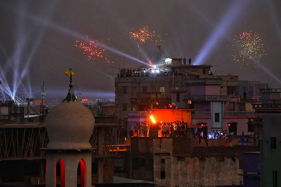 Fire and light works at Bangla Bazar in Old Dhaka to celebrate Poush Shankranti, also known as Shakrain on 14 January.