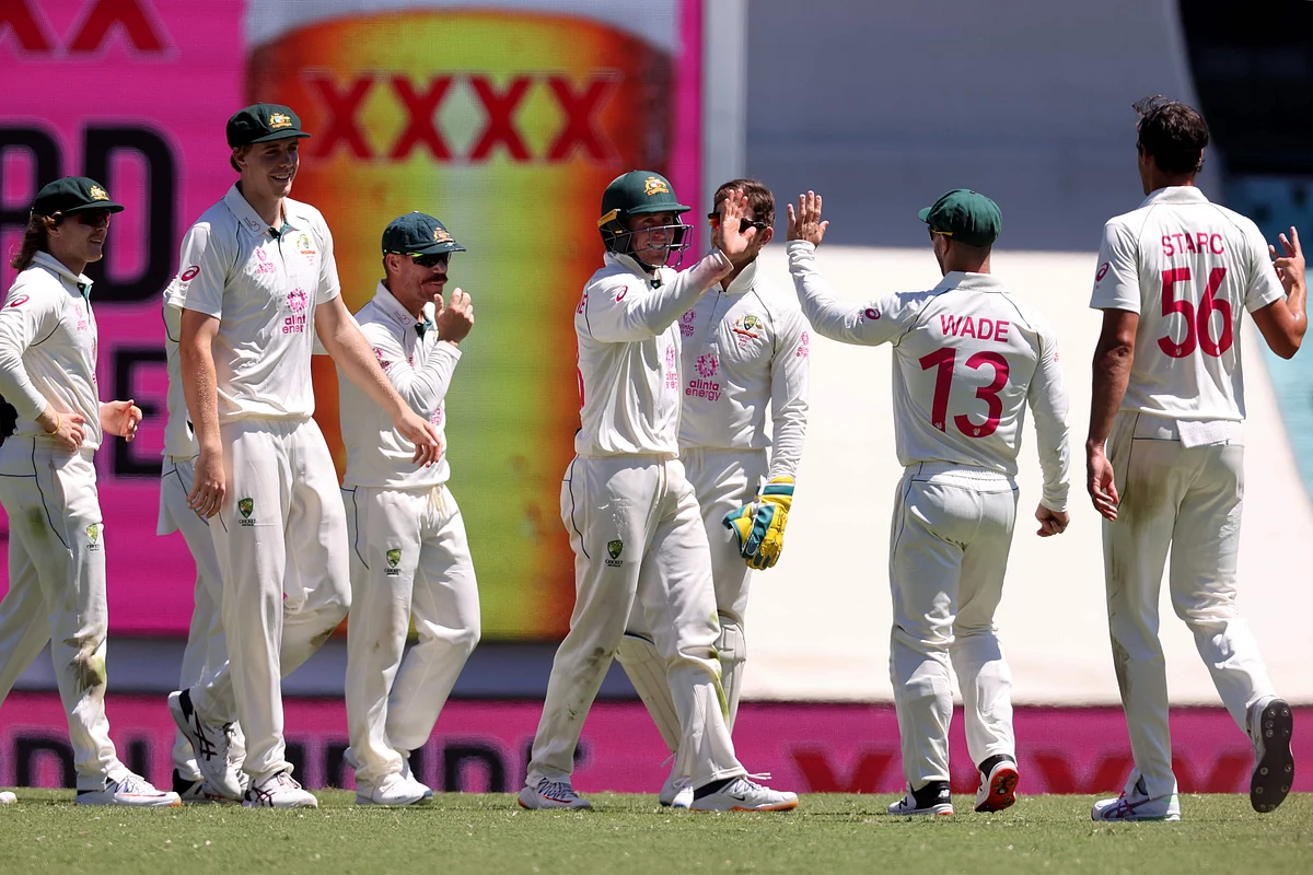 ustralia's Marnus Labuschagne (C) celebrates with teammates after the dismissal of India's Jasprit Bumrah on the third day of the third cricket Test match between Australia and India at the Sydney Cricket Ground (SCG) in Sydney on 9 January 2021