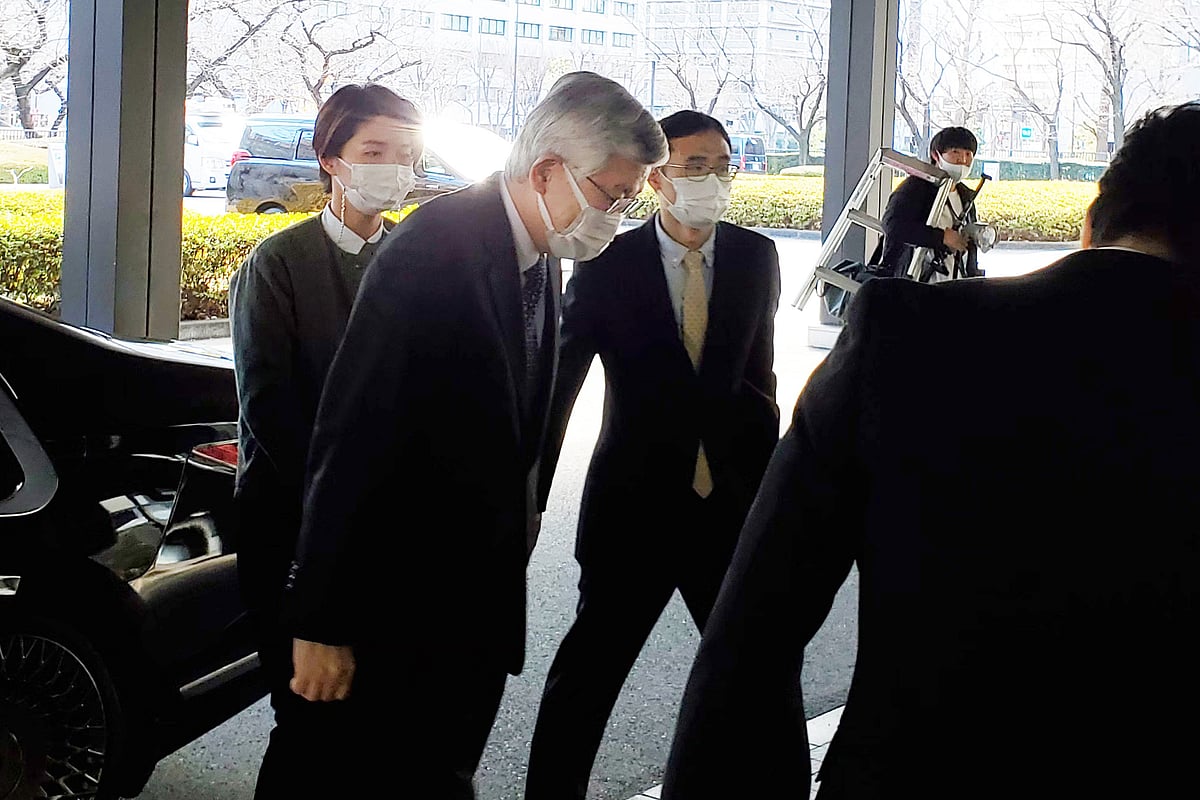 South Korean ambassador to Japan Nam Gwan-pyo (C) arrives after being summoned to the Foreign Ministry in Tokyo on 8 January 2021, as Tokyo denounced a South Korean court ruling ordering the Japanese government to pay compensation to twelve World War II sex slaves