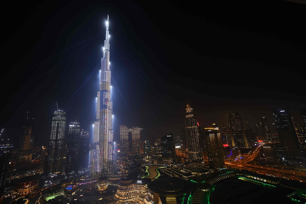 Dubai's Burj Khalifa is lit up in the colours of Japan's flag on 9 February 2021, as the UAE's "Al-Amal" -- Arabic for "Hope" -- probe successfully entered Mars' orbit, making history as the Arab world's first interplanetary mission