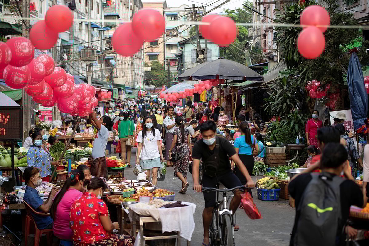 Shops are decorated with red balloons during a campaign against the military coup in Yangon, Myanmar 5 February , 2021