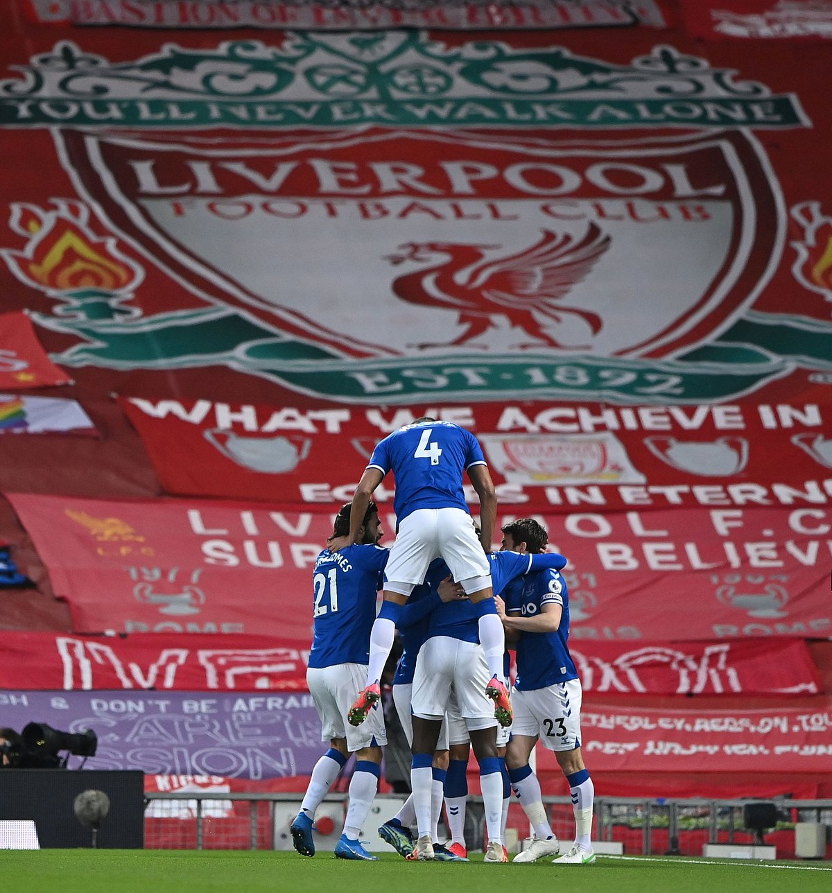 Everton's Richarlison celebrates scoring their first goal with teammates