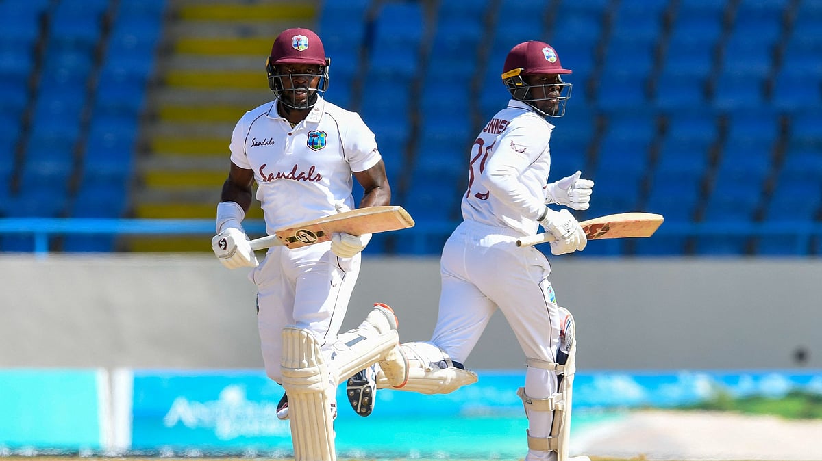 Kyle Mayers (L) and Nkrumah Bonner (R) of West Indies 100 run partnership during the 5th and final day of the 1st Test between West Indies and Sri Lanka at Vivian Richards Cricket Stadium in North Sound, Antigua and Barbuda, on 25 March 2021