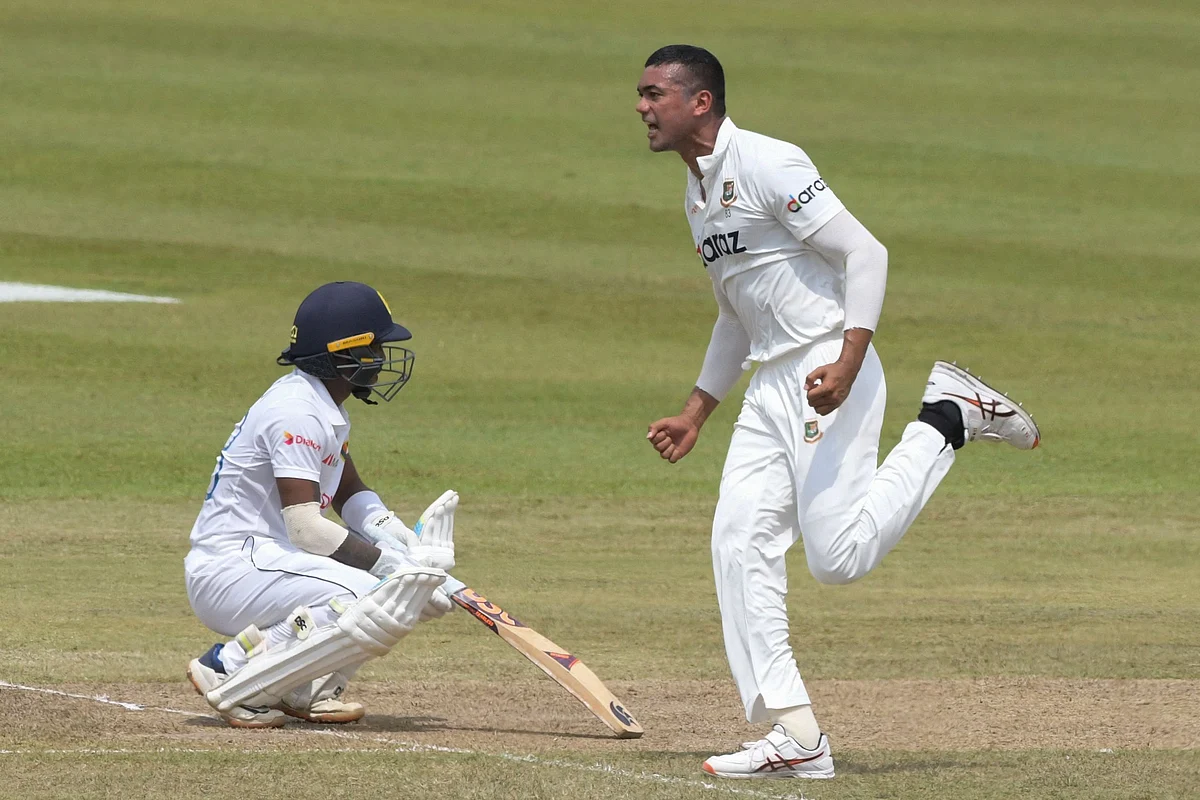 Taskin Ahmed (R) celebrates after he dismissed Sri Lanka's Pathum Nissanka (L) during the second day of the second and final Test cricket match between Sri Lanka and Bangladesh at the Pallekele International Cricket Stadium in Kandy on 30 April, 2021