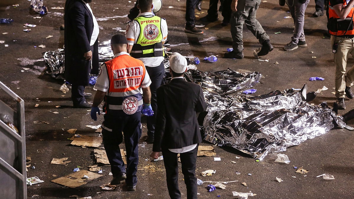 Medics and rescue workers attend to the Lag B'Omer event in Mount Meron, northern Israel, where fatalities were reported among the thousands of ultra-Orthodox Jews gathered at the tomb of a 2nd-century sage for annual commemorations that include all-night prayer and dance, at Mount Meron, Israel on 30 April 2021
