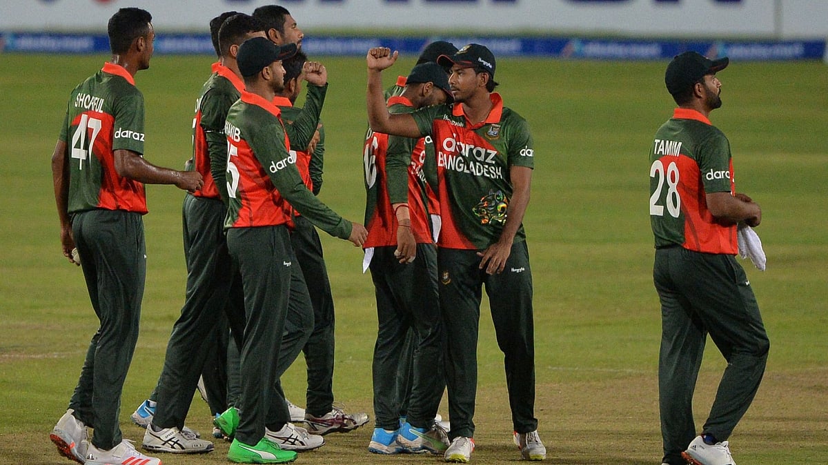 Bangladesh's cricketers walk off the field after winning the second one-day international (ODI) cricket match against Sri Lanka at the Sher-e-Bangla National Cricket Stadium in Dhaka on 25 May 25, 2021.