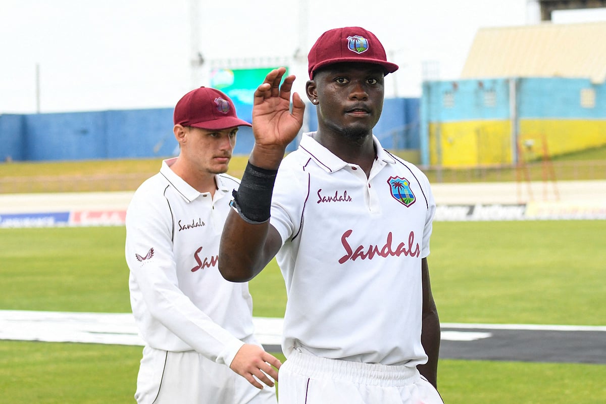 Jayden Seales of West Indies waves to teammates at the end of day 1 of the 1st Test between South Africa and West Indies at Darren Sammy Cricket Ground, Gros Islet, Saint Lucia, on 10 June 2021