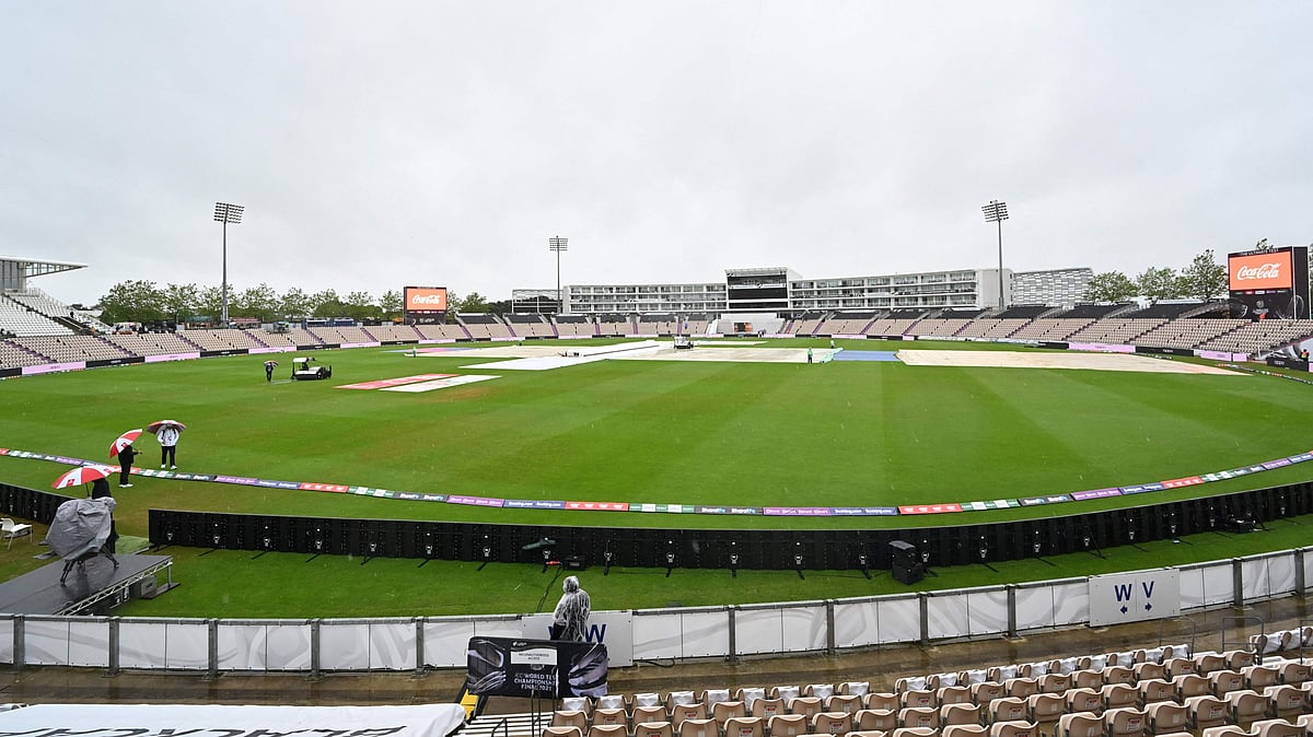 Rain covers remain on the pitch on the first day of the ICC World Test Championship Final between New Zealand and India at the Ageas Bowl in Southampton, southwest England on 18 June 2021