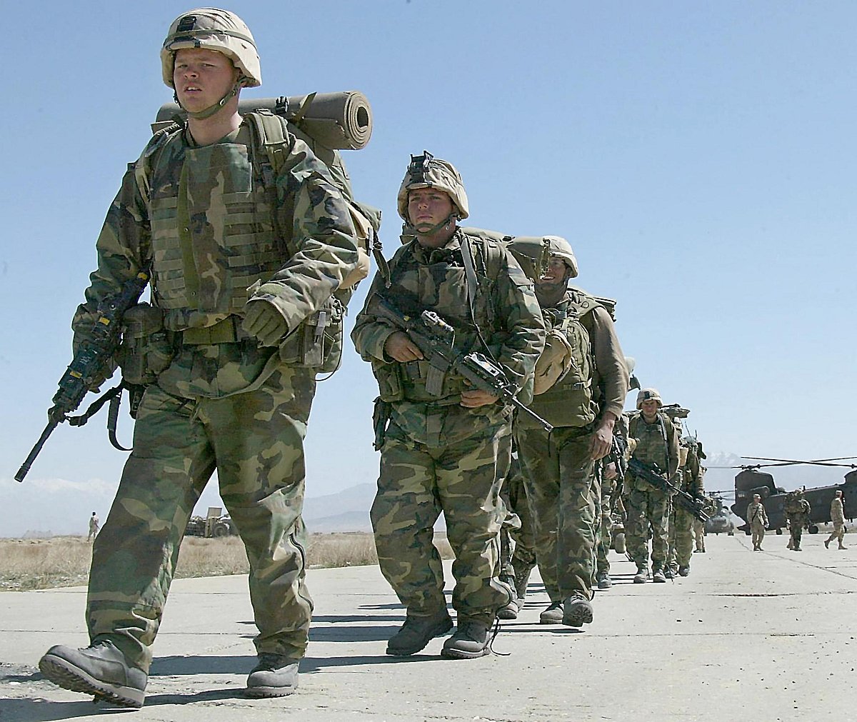 In this file photo taken on 12 March 2002, US soldiers arrive at Bagram Air Base, in Bagram. All US and NATO troops have left Bagram Air Base, a US defence official told AFP Friday, signalling the complete withdrawal of foreign forces from Afghanistan was imminent