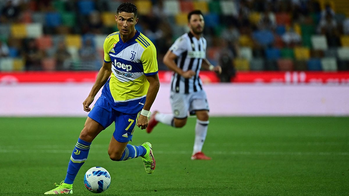 Juventus' Portuguese forward Cristiano Ronaldo drives the ball during the Italian Serie A football match between Udinese and Juventus at the Dacia Arena Stadium in Udine, on 22 August 2021