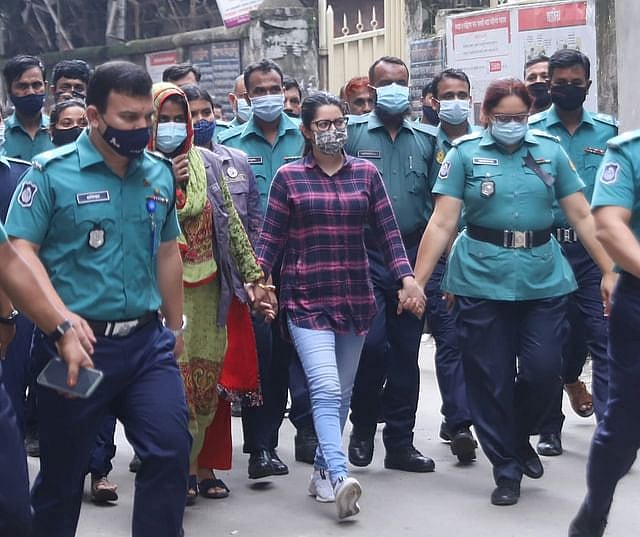 After remand of four days, Pori Moni is produced before the court in Dhaka on 10 August.