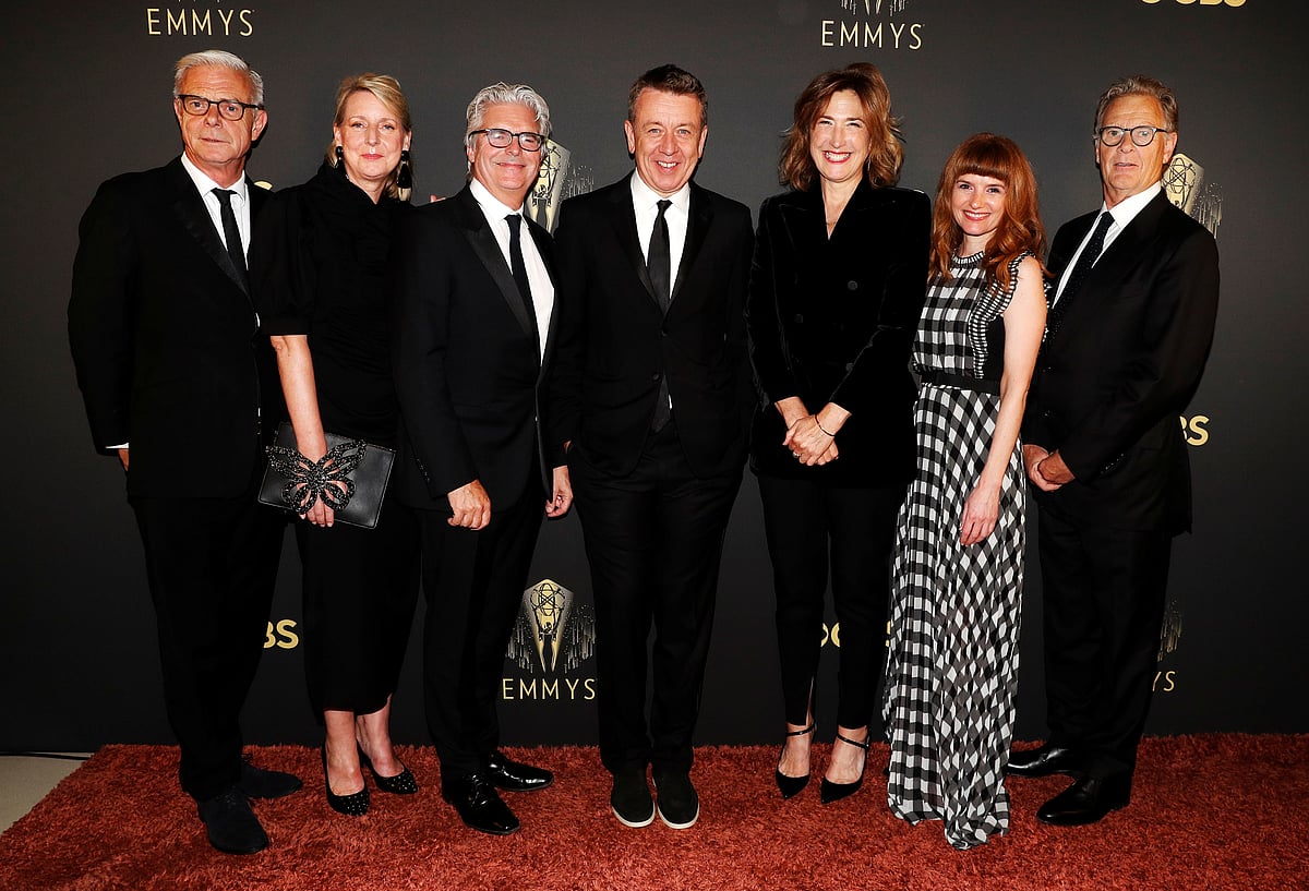 Showrunner Peter Morgan, Director Jessica Hobbs, Executive Producers Stephen Daldry, Robert Fox, Matthew Byam Shaw and Suzanne Mackie, and Producer Oona O'Beirn, pose at the Netflix UK Primetime Emmy Red Carpet for "The Crown" in London, Britain on 19 September  2021
