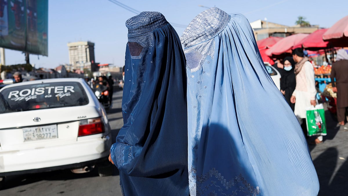 Afghan women walk down a street in Kabul, Afghanistan, on 16 September 2021