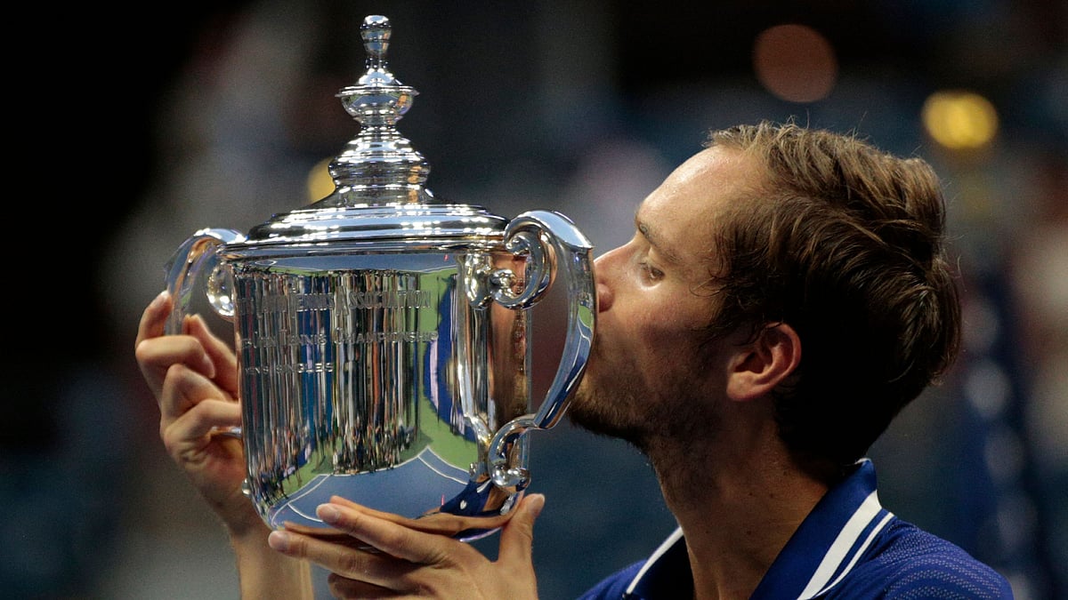 Russia's Daniil Medvedev kisses the trophy after winning the 2021 US Open Tennis tournament men's final match against Serbia's Novak Djokovic at the USTA Billie Jean King National Tennis Center in New York, on 12 September, 2021