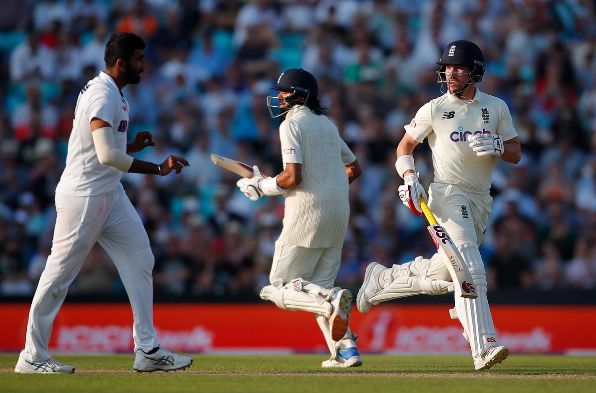 England's Rory Burns and Haseeb Hameed in action as India's Ravindra Jadeja looks on