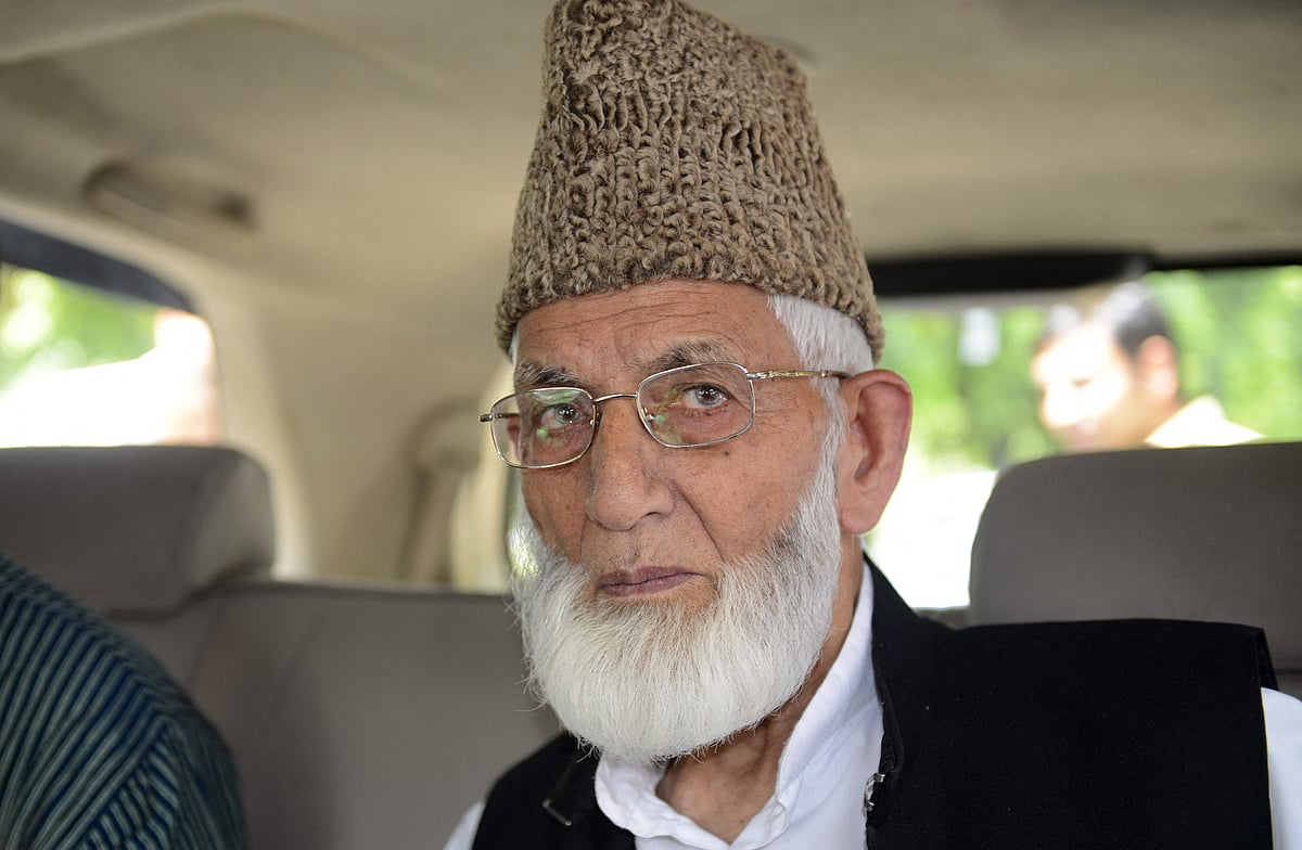 In this file photo taken on 19 August 2014 Kashmiri separatist leader Syed Ali Shah Geelani arrives at the Pakistan embassy in New Delhi.