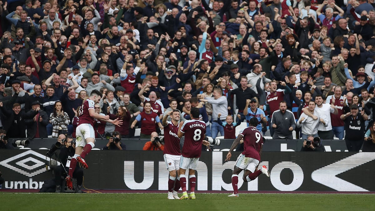 West Ham United's Michail Antonio celebrates scoring their first goal with teammates