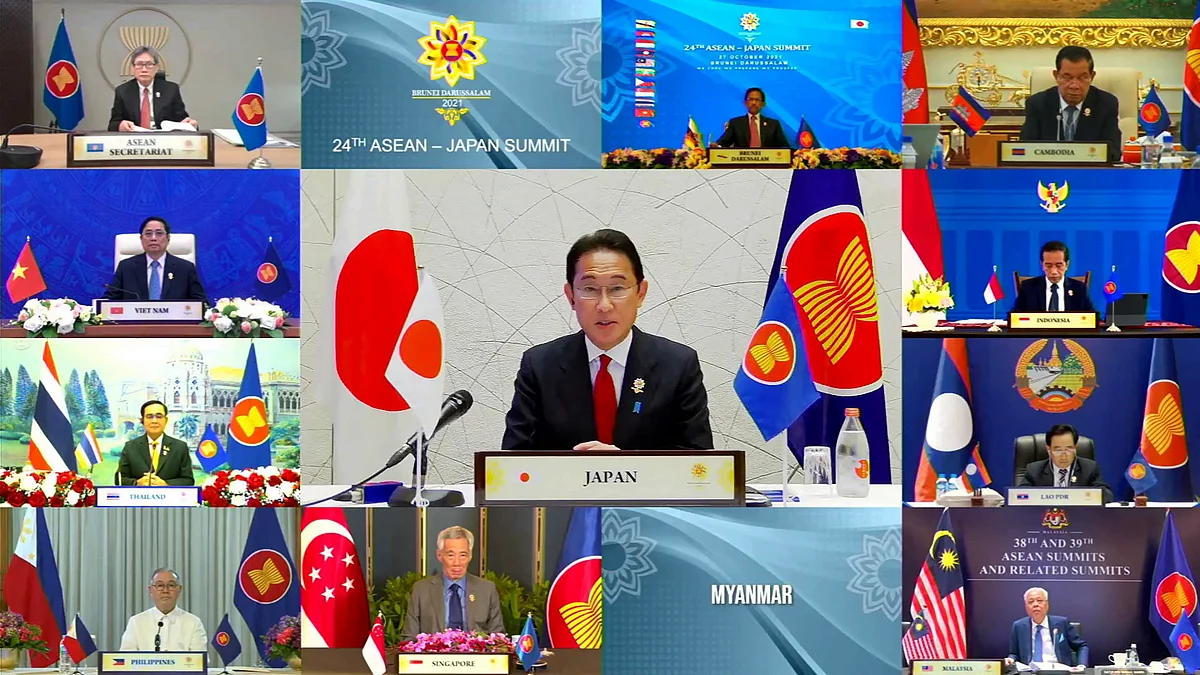This handout photo released by the host broadcast, ASEAN Summit 2021, on 27 October, 2021 shows Japan's Prime Minister Fumio Kishida (C) taking part in the ASEAN-Japan Summit on the sidelines of the 2021 Association of Southeast Asian Nations (ASEAN) summit, held online on a live video conference in Brunei's capital Bandar Seri Begawan