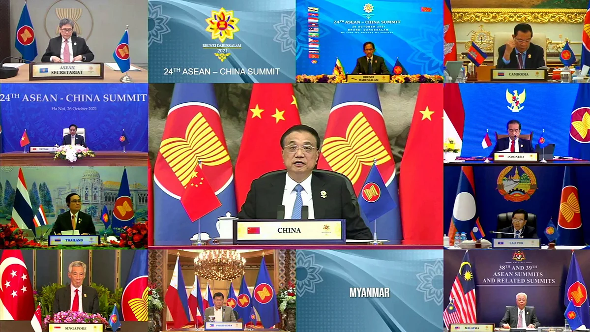 This handout photo released by the host broadcast, ASEAN Summit 2021, on 26 October, 2021 shows Chinese Premier Li Keqiang (C) taking part in the ASEAN-China Summit on the sidelines of the 2021 Association of Southeast Asian Nations (ASEAN) summits held online on a live video conference in Bandar Seri Begawan, Brunei