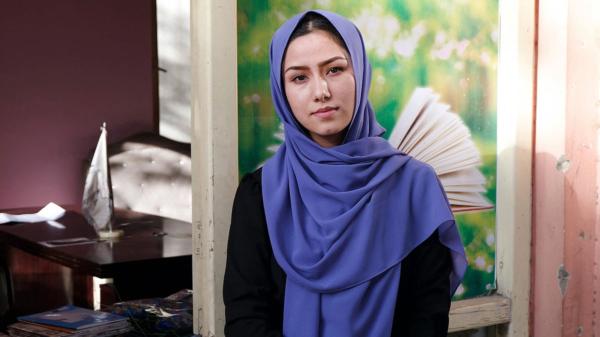 This picture taken on 16 October 2021 shows school teacher Nasrin Hasani posing for pictures during an interview with AFP in Kabul