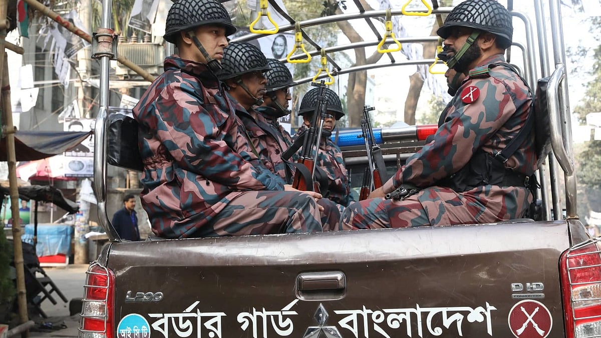 Members of Border Guard Bangladesh (BGB) patrol along the road at City Corporation Market, Bakshi Bazar during the city corporation elections on 1 February 2020