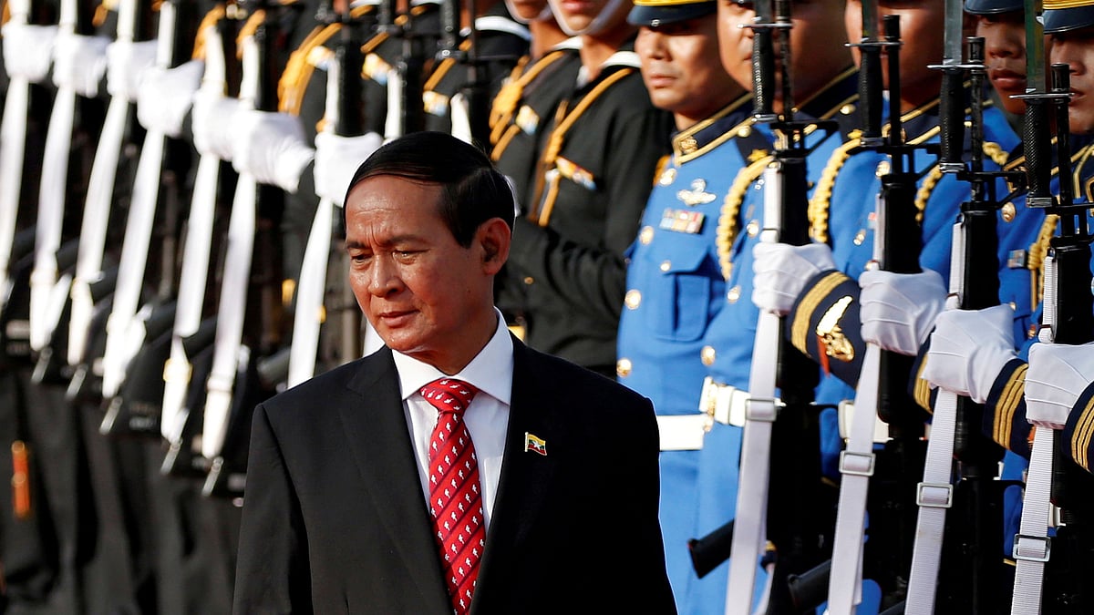 Myanmar's president Win Myint reviews the honor guard during his welcome ceremony at the Government House in Bangkok, Thailand on 14 June 2018