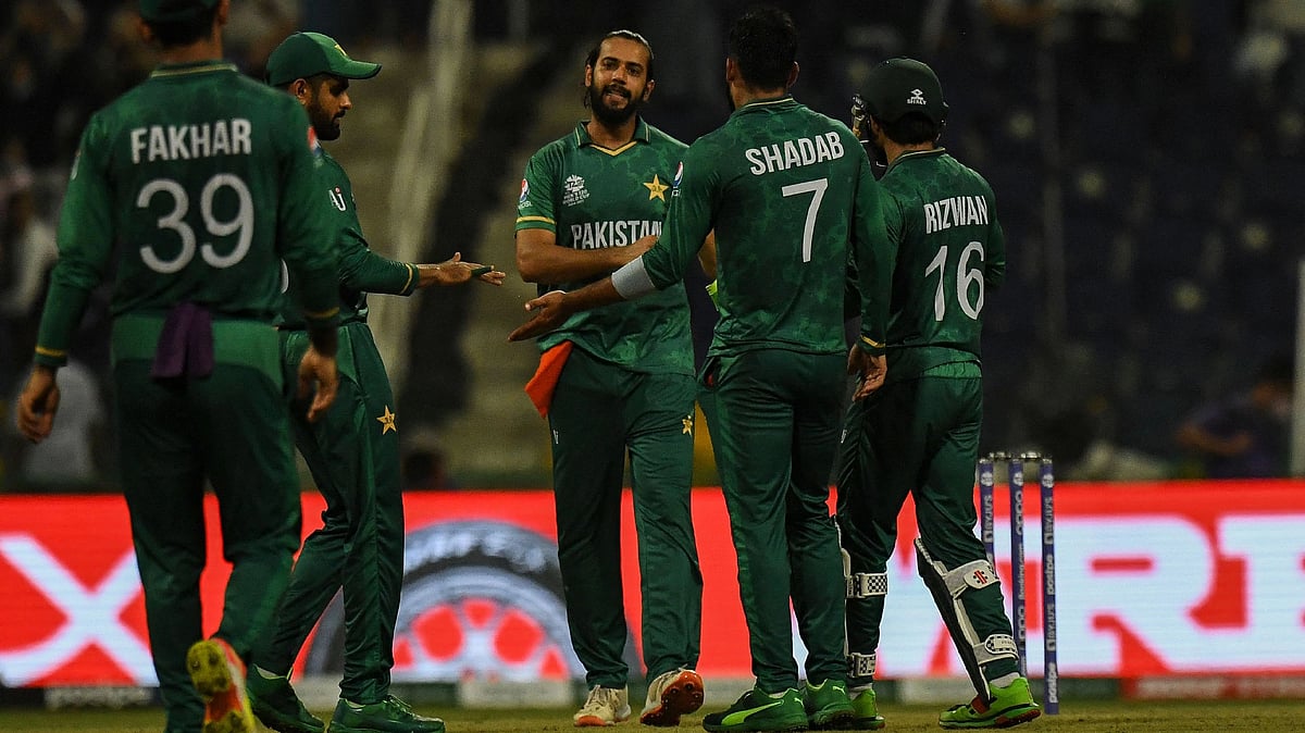 Pakistan's cricketers celebrates after the dismissal of Namibia's Craig Williams (not pictured) during the ICC men’s Twenty20 World Cup cricket match between Namibia and Pakistan at the Sheikh Zayed Cricket Stadium in Abu Dhabi on 2 November, 2021