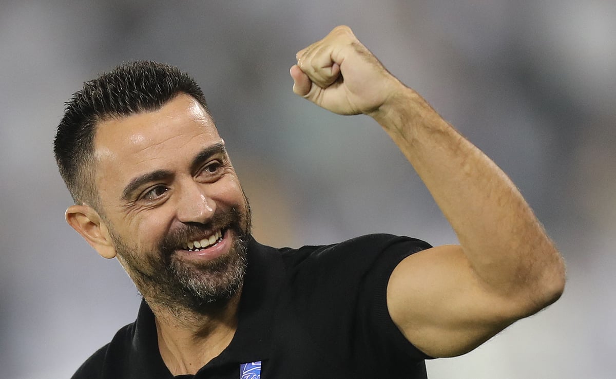 In this file photo taken on 1 October, 2019 then Sadd's Xavi Hernandez reacts after a goal during the first leg of the AFC Champions League semi-finals football match between Qatar's Al Sadd and Saudi' Al Hilal at the Jassim bin Hamad Stadium in the Qatari capital Doha