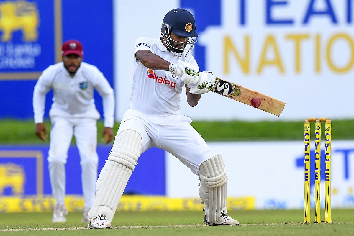 Sri Lanka's captain Dimuth Karunaratne plays a shot during the first day of the second Test cricket match between Sri Lanka and West Indies at the Galle International Cricket Stadium in Galle on 29 November, 2021