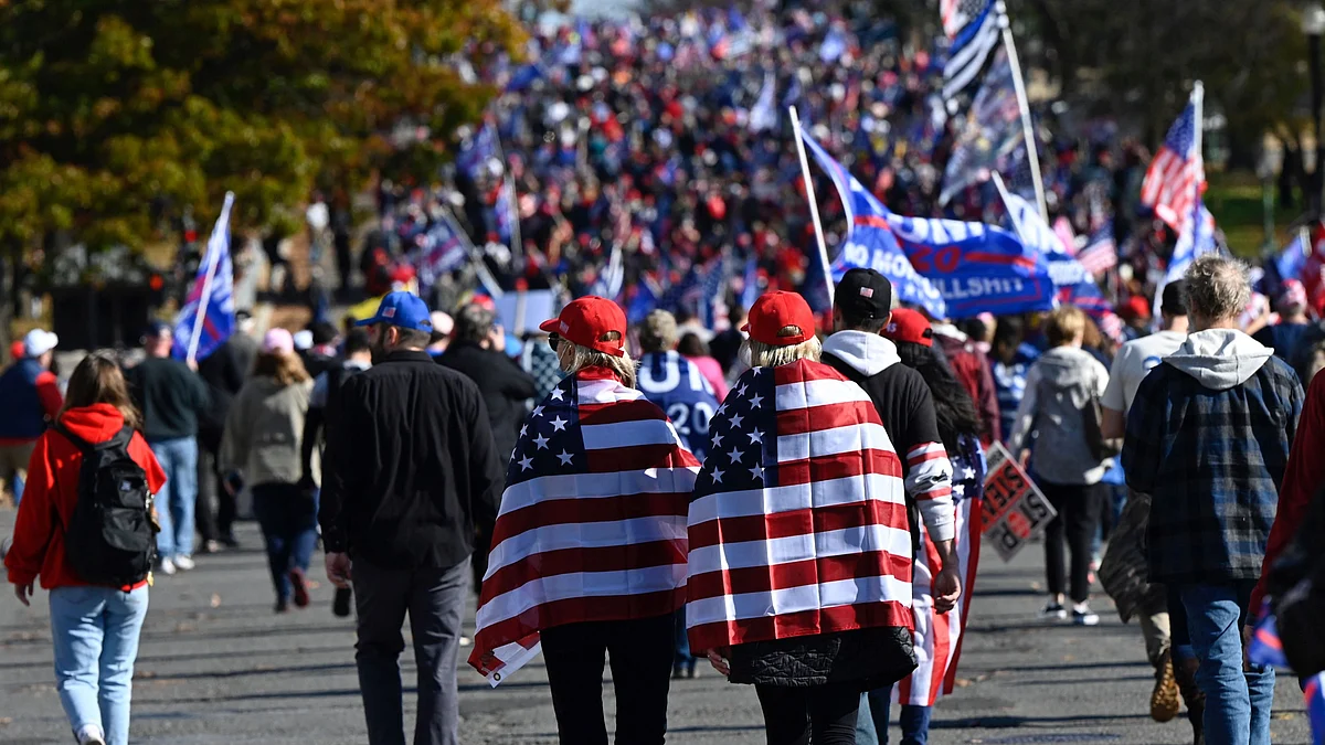 In this file photo taken on 14 November 2020 supporters of US President Donald Trump and his claim that the 3 November election was fraudulent rally in Washington, DC