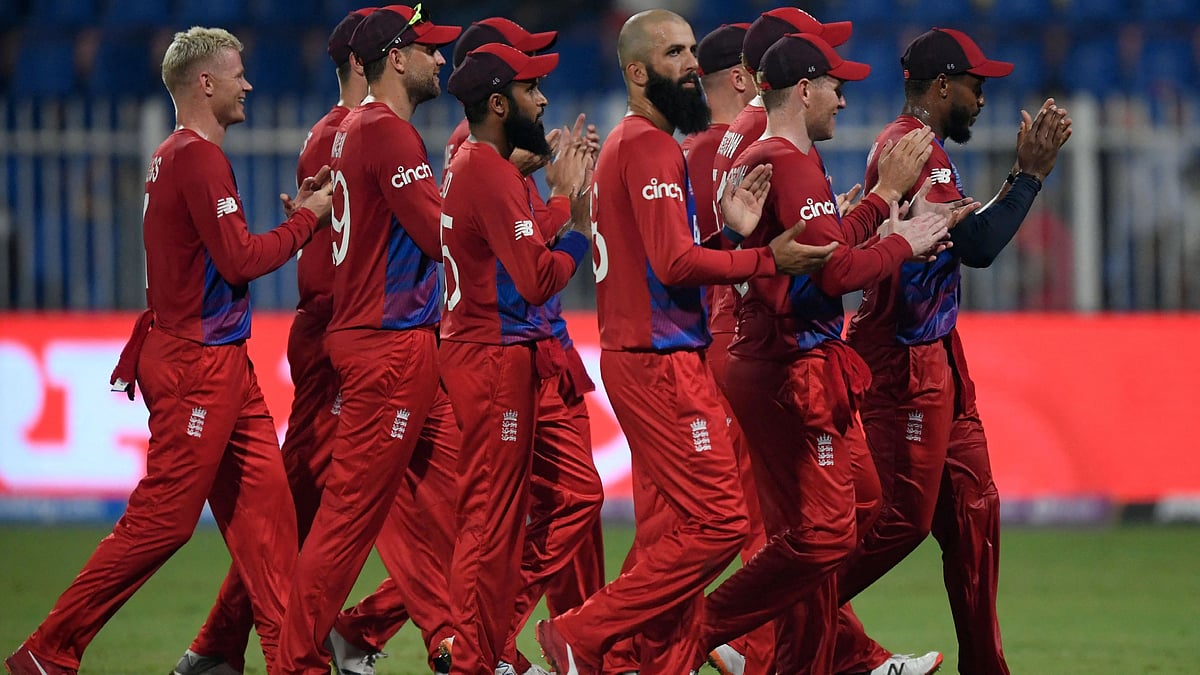 England's players celebrate their win in the ICC men’s Twenty20 World Cup cricket match between England and Sri Lanka at the Sharjah Cricket Stadium in Sharjah on 1 November, 2021