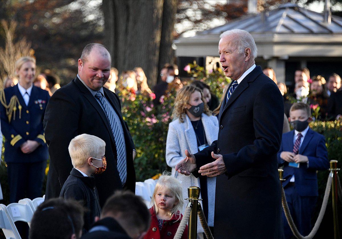 US President Joe Biden greets attendees during the White House Thanksgiving turkey pardon in the Rose Garden of the White House in Washington, DC on 19 November, 2021