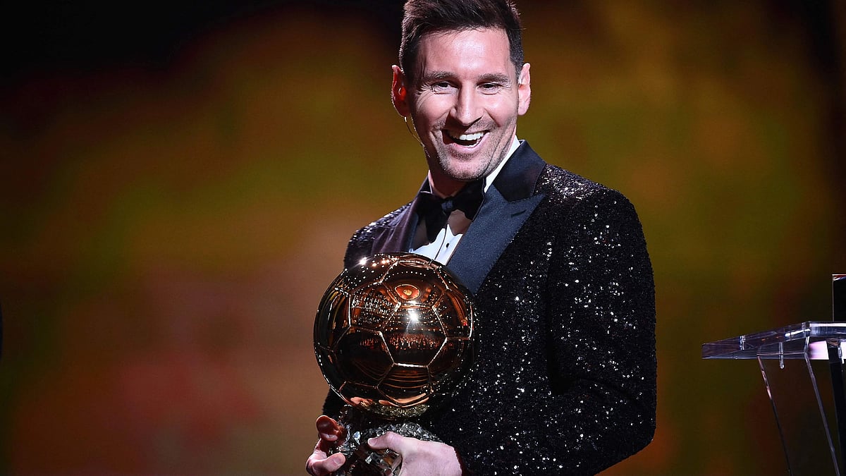 Paris Saint-Germain's Argentine forward Lionel Messi reacts after being awarded the the Ballon d'Or award during the 2021 Ballon d'Or France Football award ceremony at the Theatre du Chatelet in Paris on 29 November 2021.