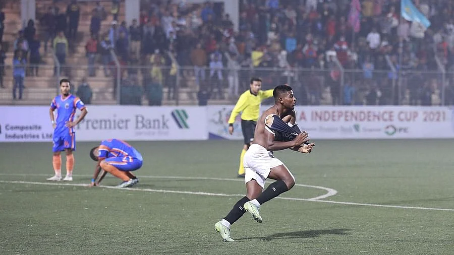 Bashundhara Kings' defender Yeasin celebrates after scoring the second goal in the 118th minute against Police FC in the semi-final of Independence Cup Football on 14 December, 2021