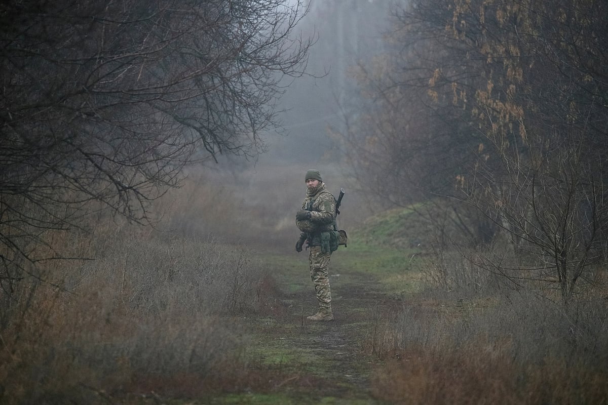 A Ukrainian serviceman is seen on the front line near the village of Travneve in Donetsk region, Ukraine, 15 December 2021.