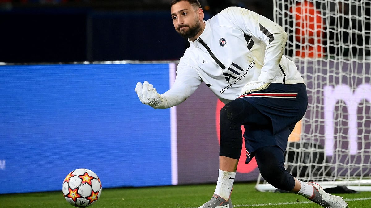 In this file photograph taken on December 7, 2021, Paris Saint-Germain's Italian goalkeeper Gianluigi Donnarumma warms up prior to an UEFA Champions League