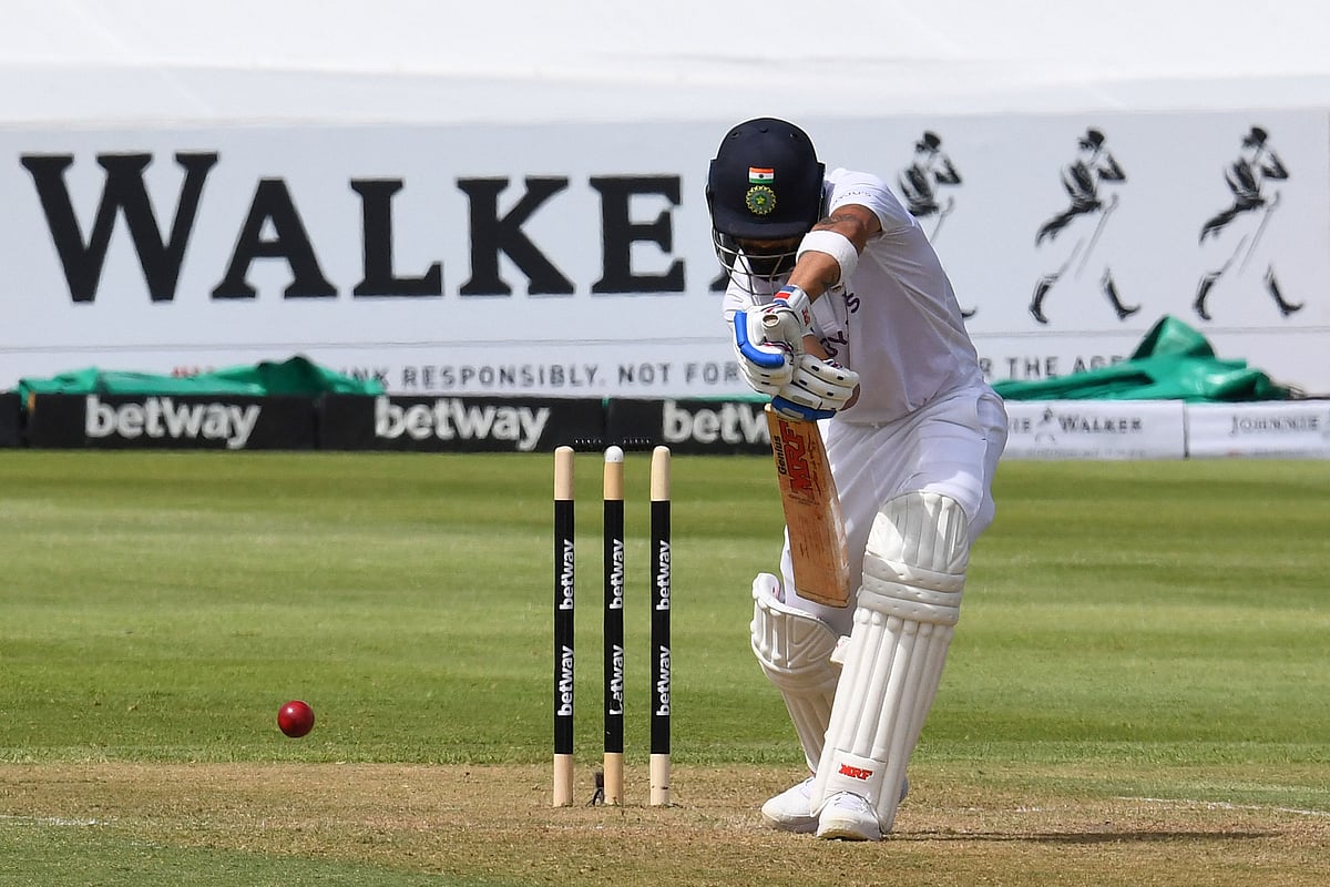 India's Virat Kohli plays a shot during the first day of the third Test cricket match between South Africa and India at Newlands stadium in Cape Town on 11 January, 2022