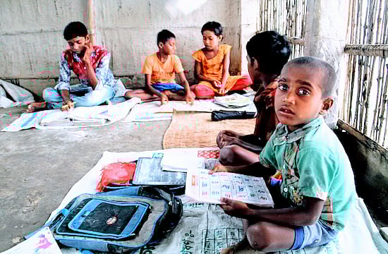 Poor children attending school despite all odds
