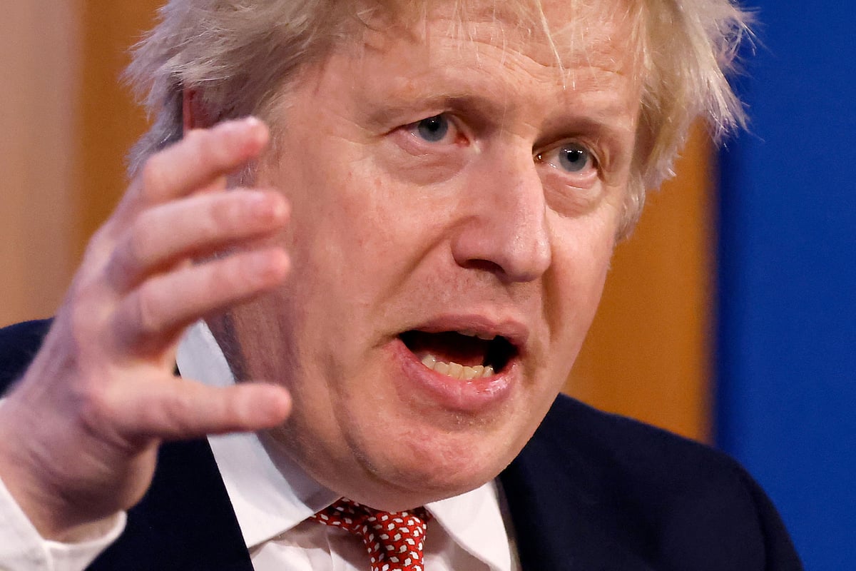 Britain's Prime Minister Boris Johnson answers questions during a press conference to outline the Government's new long-term Covid-19 plan, inside the Downing Street Briefing Room in central London on 21 February, 2022.