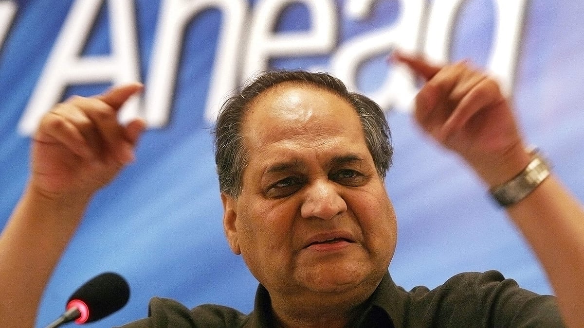 In this file photo taken on May 17, 2007, veteran industrialist Rahul Bajaj gestures during a press conference in Mumbai. Veteran industrialist Rahul Bajaj