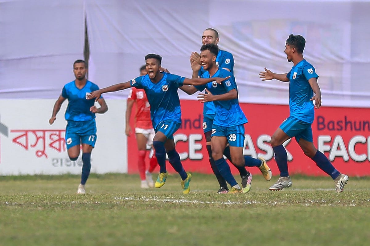 Swadhinata Krira Sangha players celebrate a goal against defending champions Bashundhara Kings at Shaheed Ahsanullah Master Stadium in Tongi on 3 February 2022