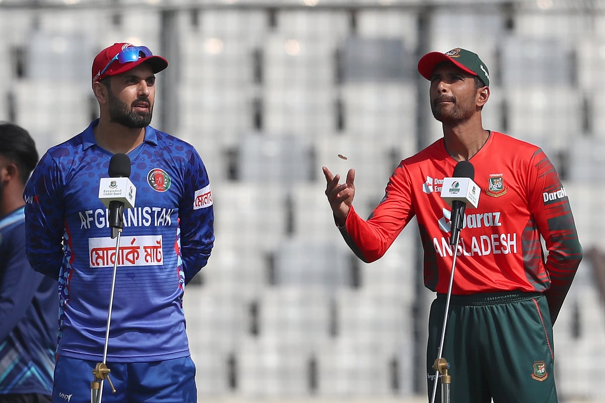 Bangladesh skipper Mahmudullah Riyad and Afghanistan captain Mohammad Nabi during the coin toss at Sher-e-Bangla National Cricket Stadium in Mirpur, Dhaka, on 5 March 2022