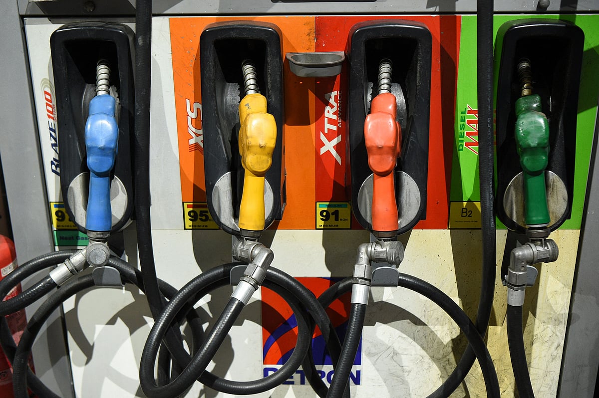 Fuel pumps are seen at a petrol station 