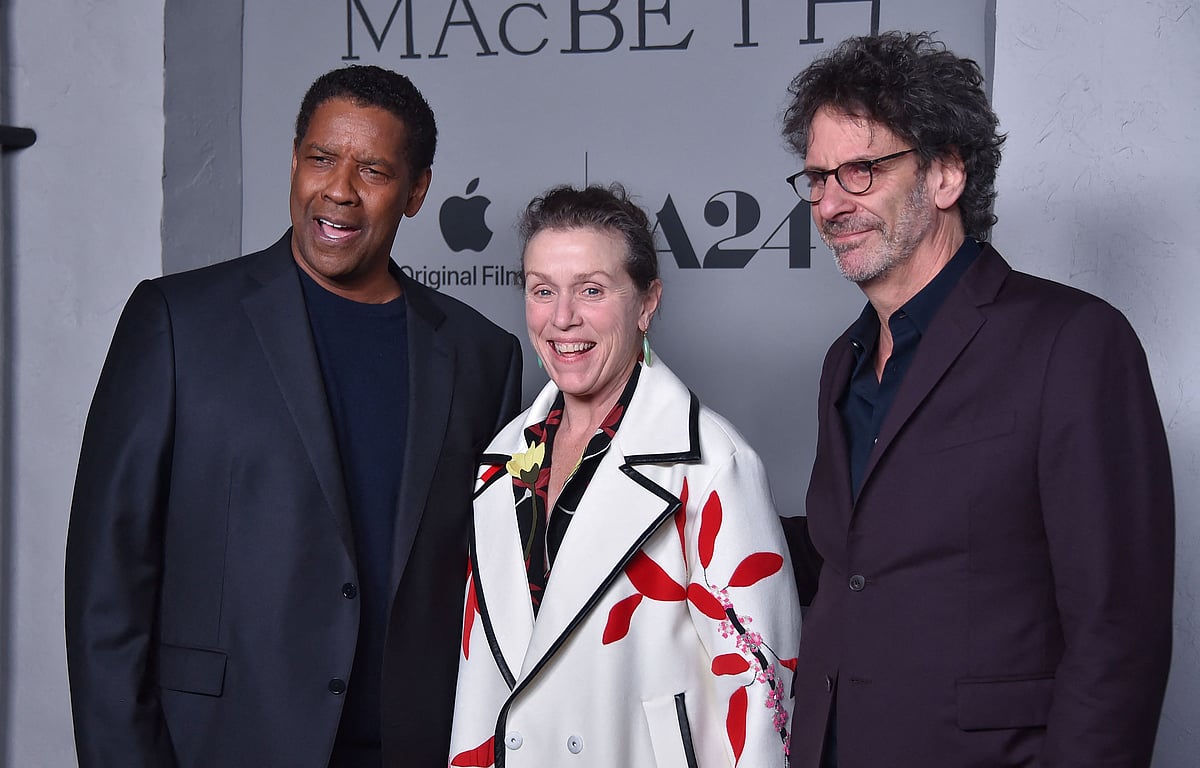 In this file photo taken on 16 December 2021 (From L) Actors Denzel Washington and Frances McDormand and Director and Producer Joel Coen attend the Los Angeles Premiere of "The Tragedy of Macbeth" at the Directors Guild of America Theatre in Los Angeles, California. Black-and-white is the hot new trend in Hollywood, where directors of Oscars-contending films such as "Belfast" and "The Tragedy of Macbeth" are embracing monochrome for its storytelling power