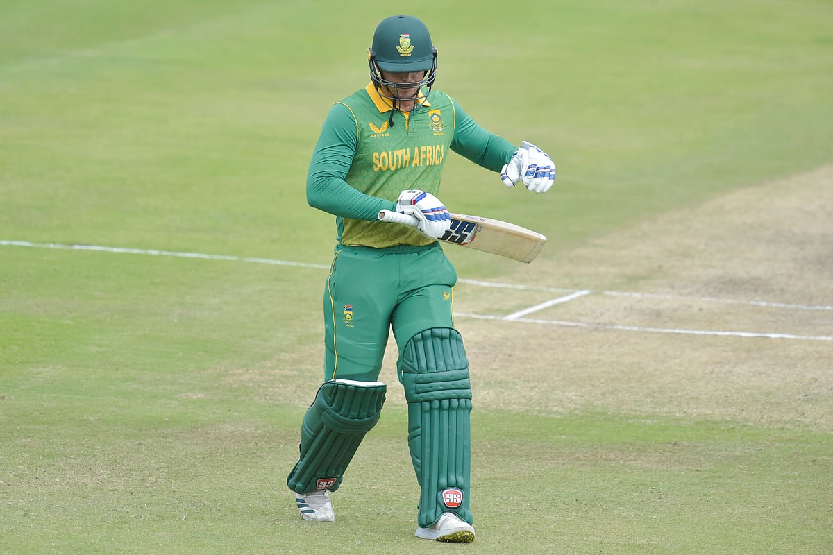 South Africa's Quinton de Kock walks back to the pavilion after his dismissal during the third one-day international (ODI) cricket match between South Africa and Bangladesh at SuperSport Park in Centurion on 23 March 2022.